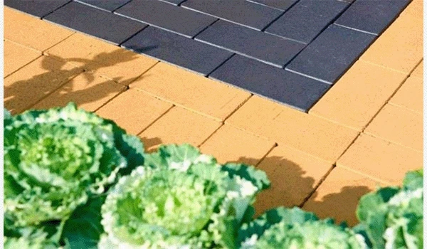 Semmelrock Penter – aranżacja żółty + antracytowo-brązowy Semmelrock Penter bruk klinkierowy 20x10x5,2 cm – aranżacja w kolorze żółtym i antracytowo-brązowym